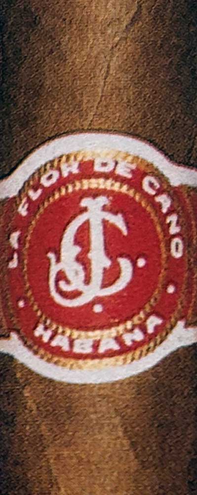 The La Flor de Cano cigar band, featuring the distinctive ‘J’ and ‘C’ for Juan and Cano.
